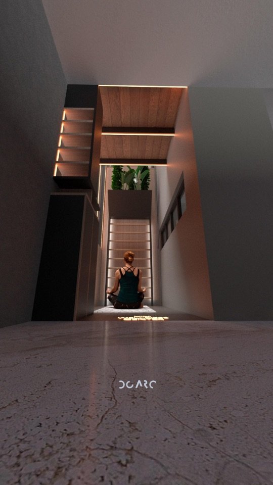Mini Wellness Center, figura meditando al fondo de un eje de luz cálida